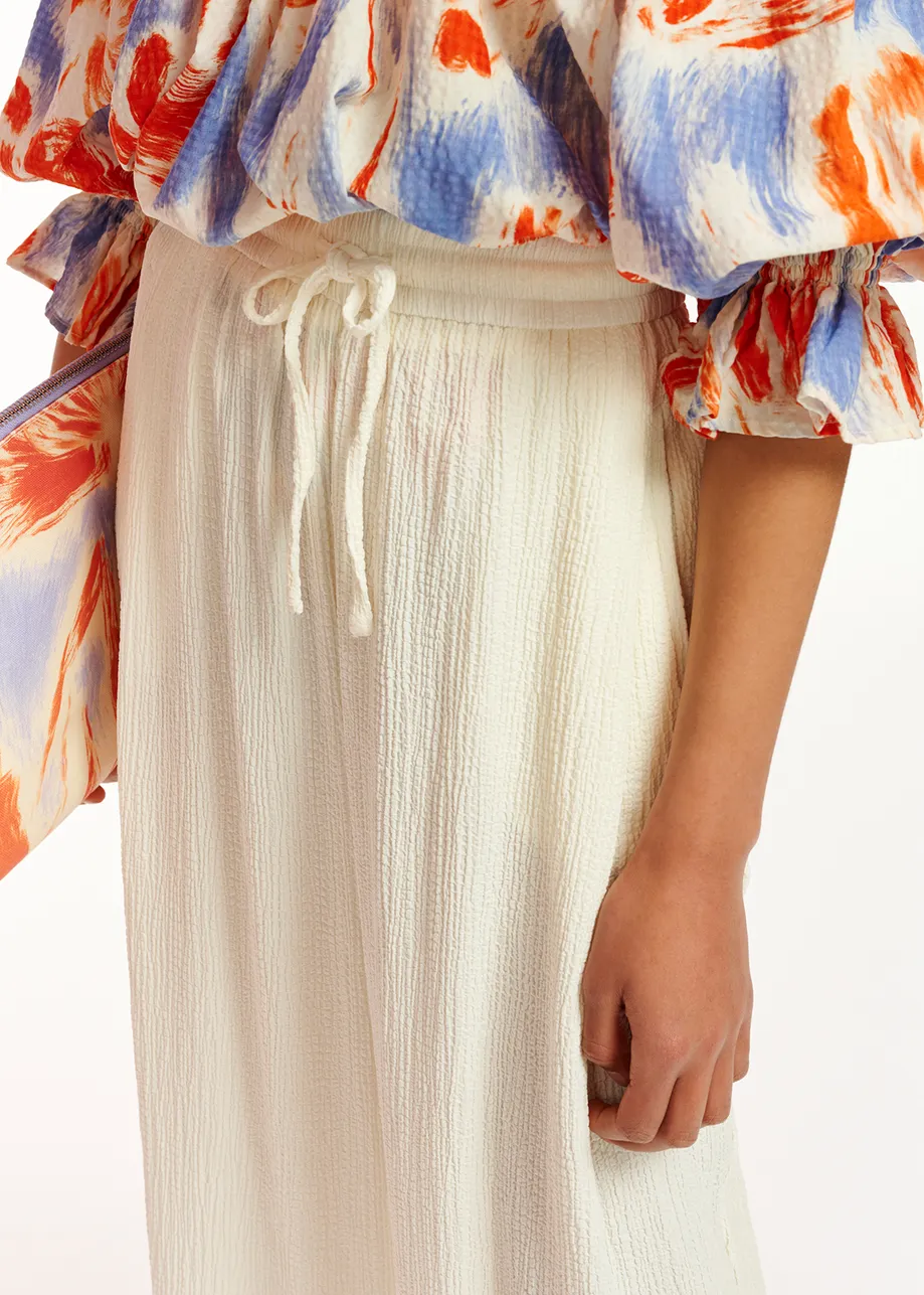 Off-white wide-leg seersucker pants