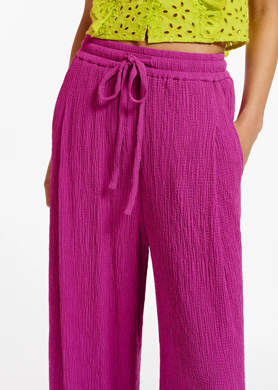 Purple wide-leg seersucker pants