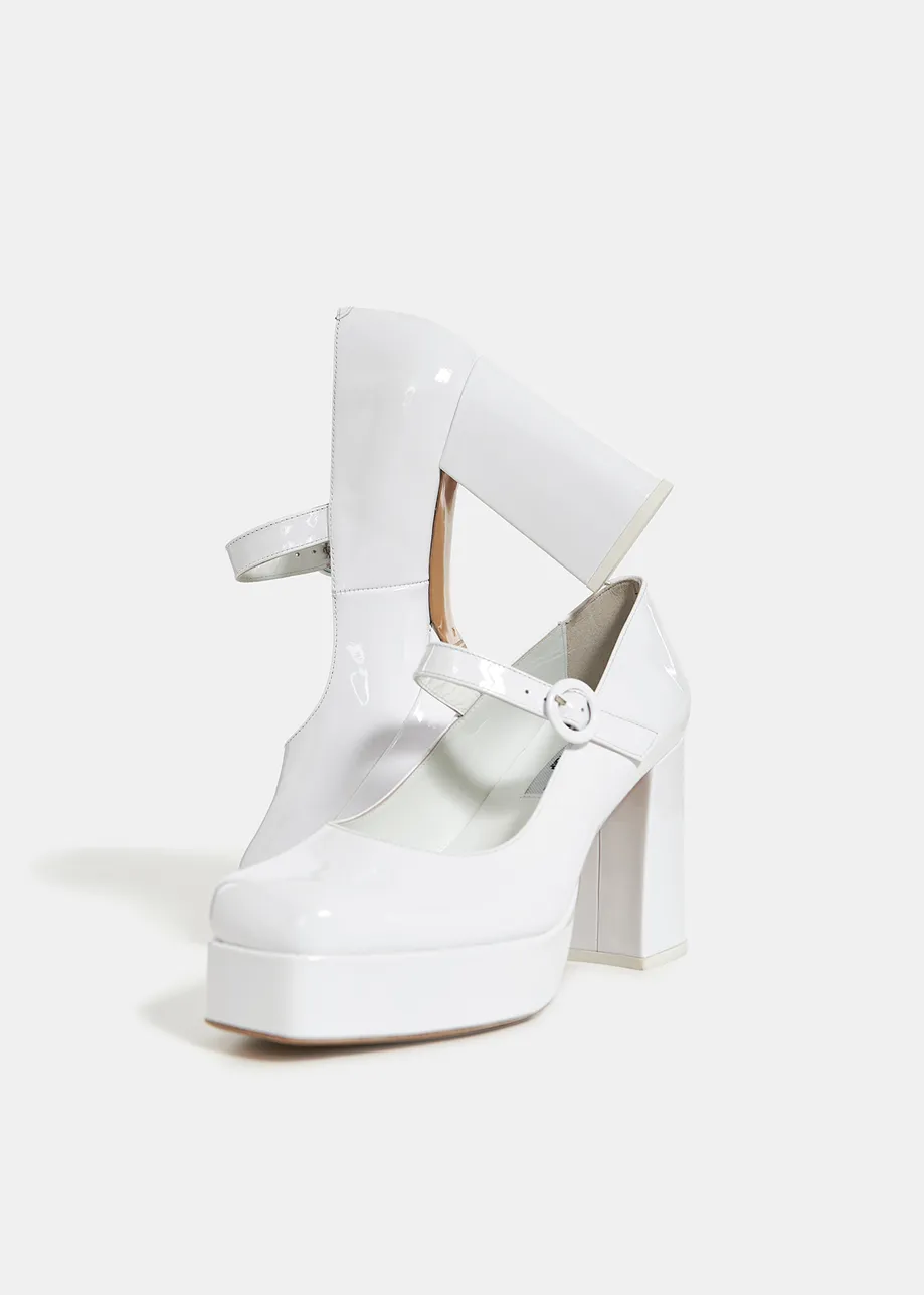White patent-leather platform pumps