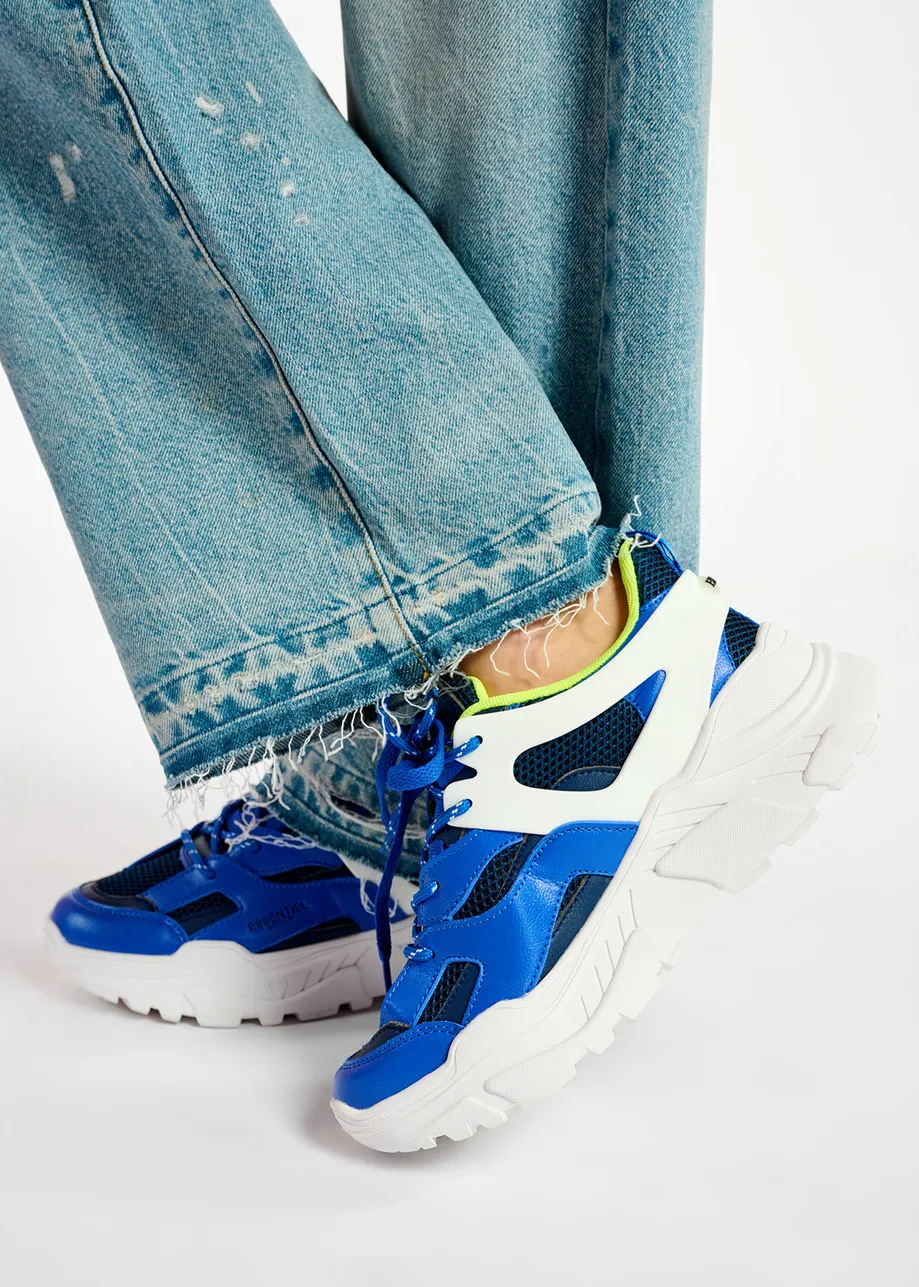 Dark blue and white sneakers set on chunky soles