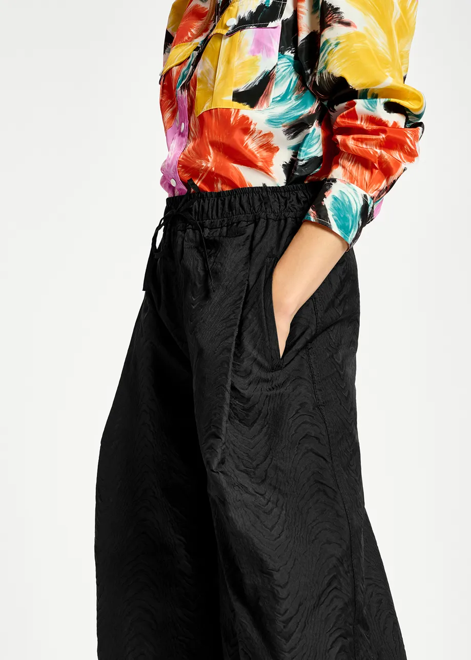 Zwarte jacquard broek met brede pijpen