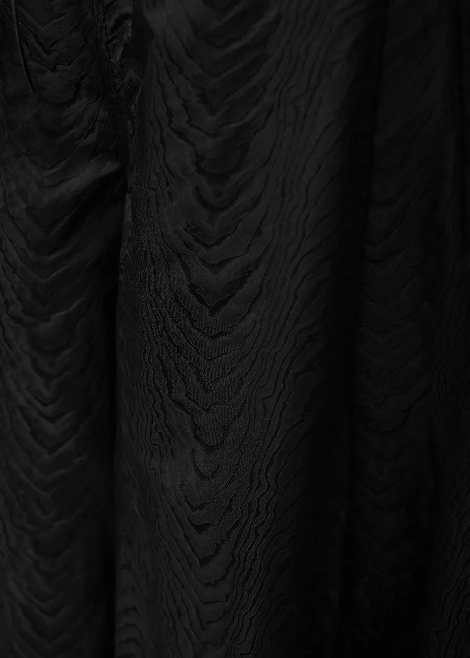 Zwarte jacquard broek met brede pijpen