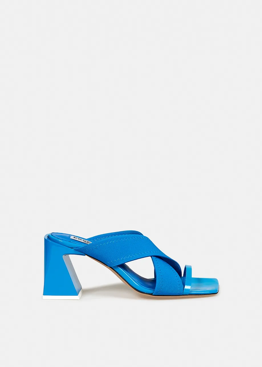 Blue crossover-strap mules