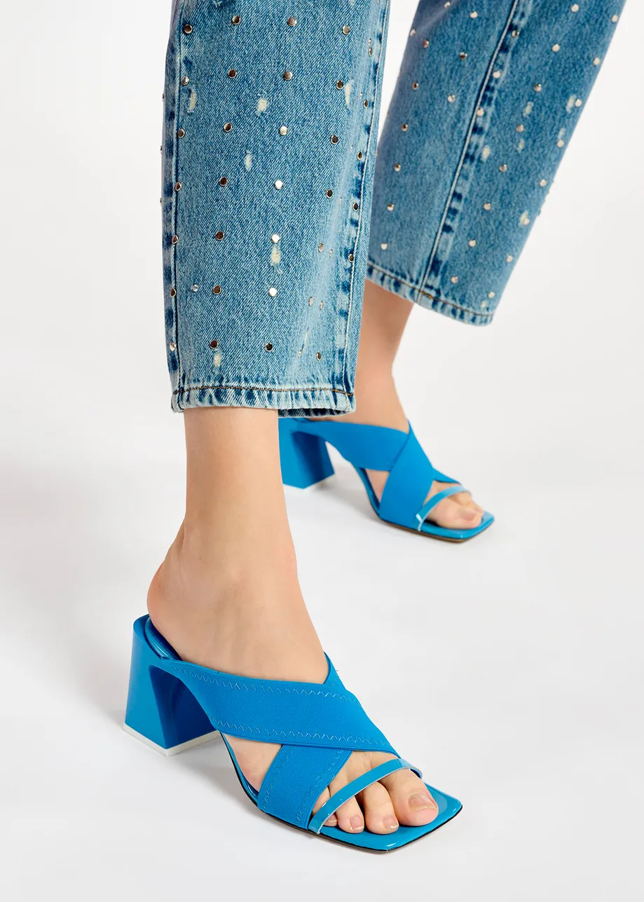 Blue crossover-strap mules