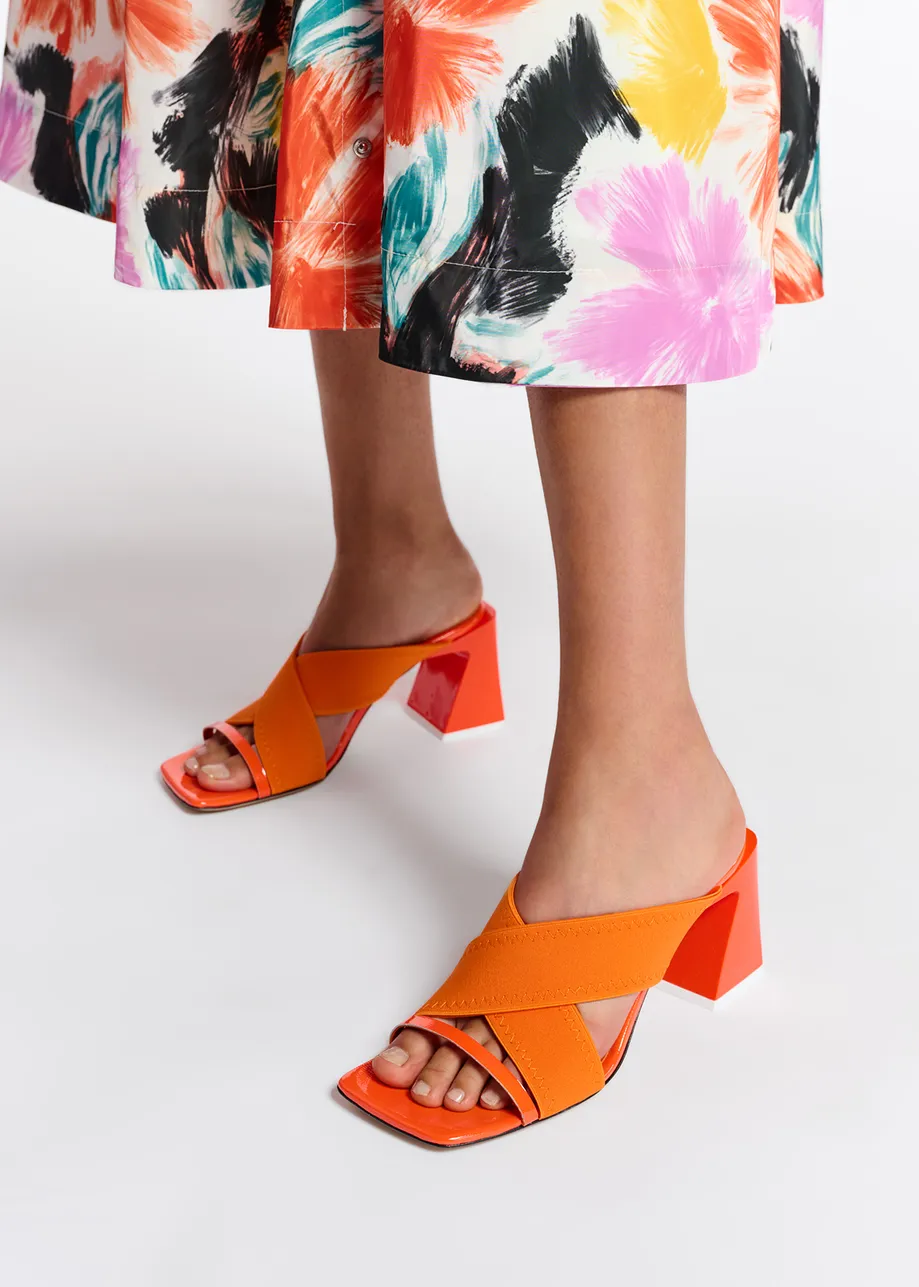 Orange crossover-strap mules