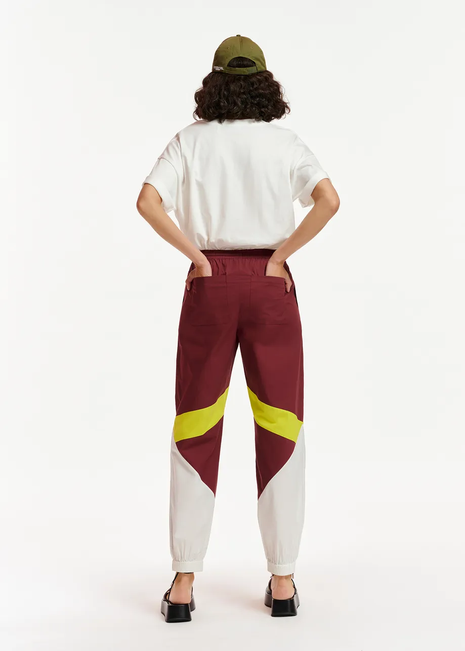 Burgundy, white and lime green cotton track pants