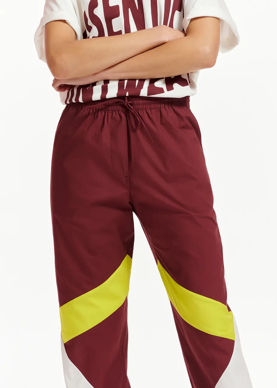 Burgundy, white and lime green cotton track pants