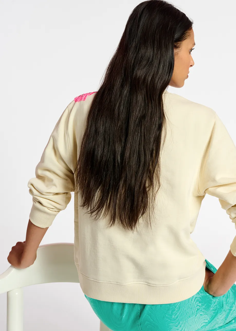 Ecru sweatshirt with floral sequin embroideries