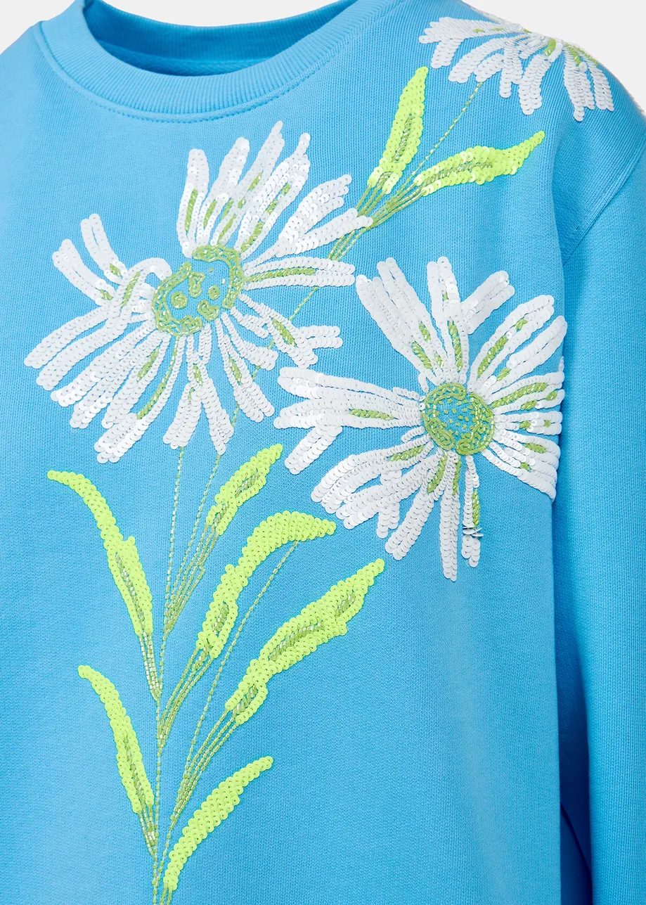 Blue sweatshirt with floral sequin embroideries