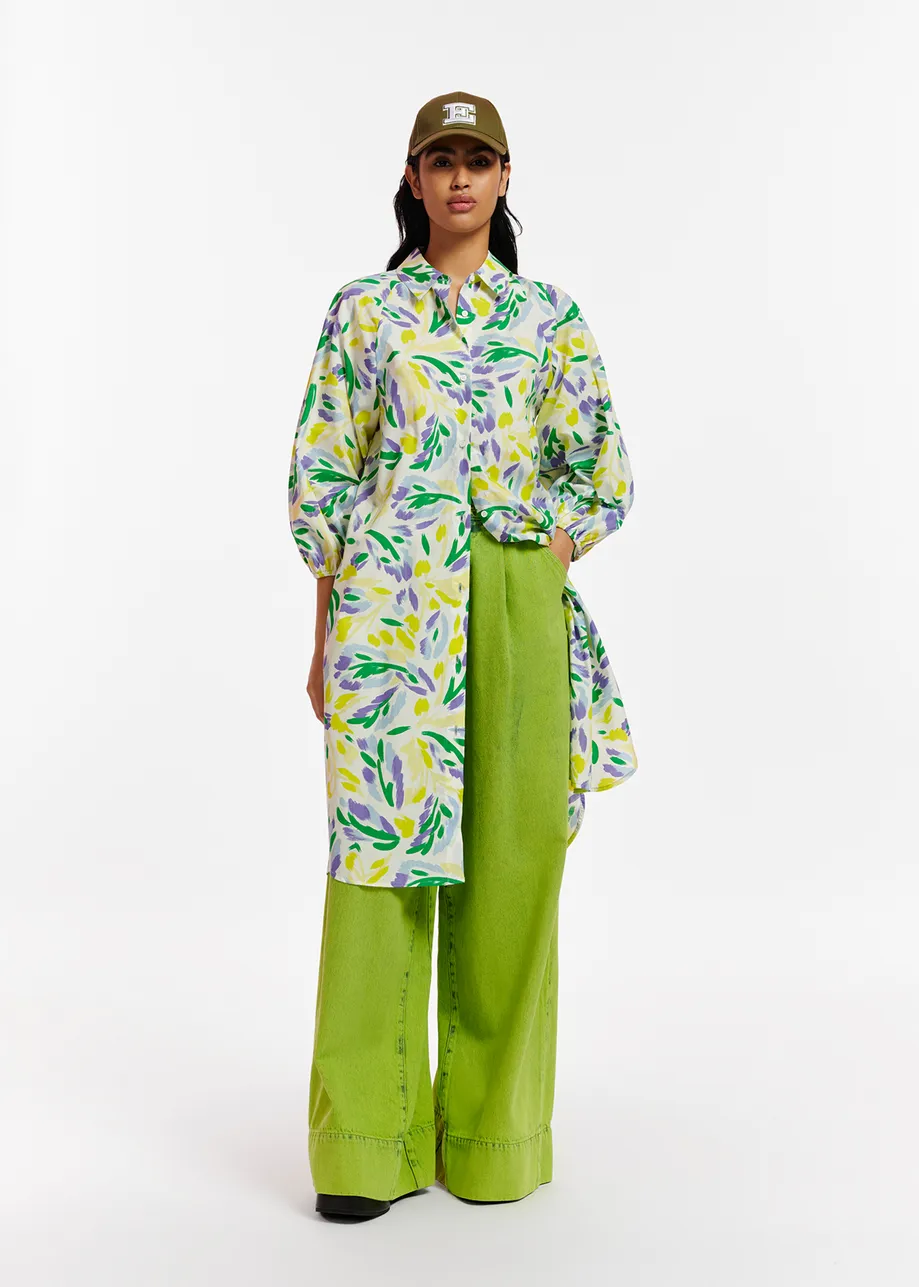 White, yellow and purple knee-length shirt dress with floral print