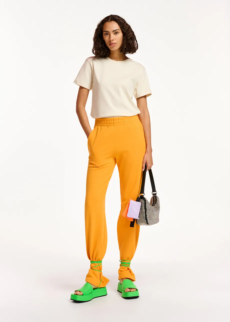 Oranje joggingbroek van biokatoen-jersey