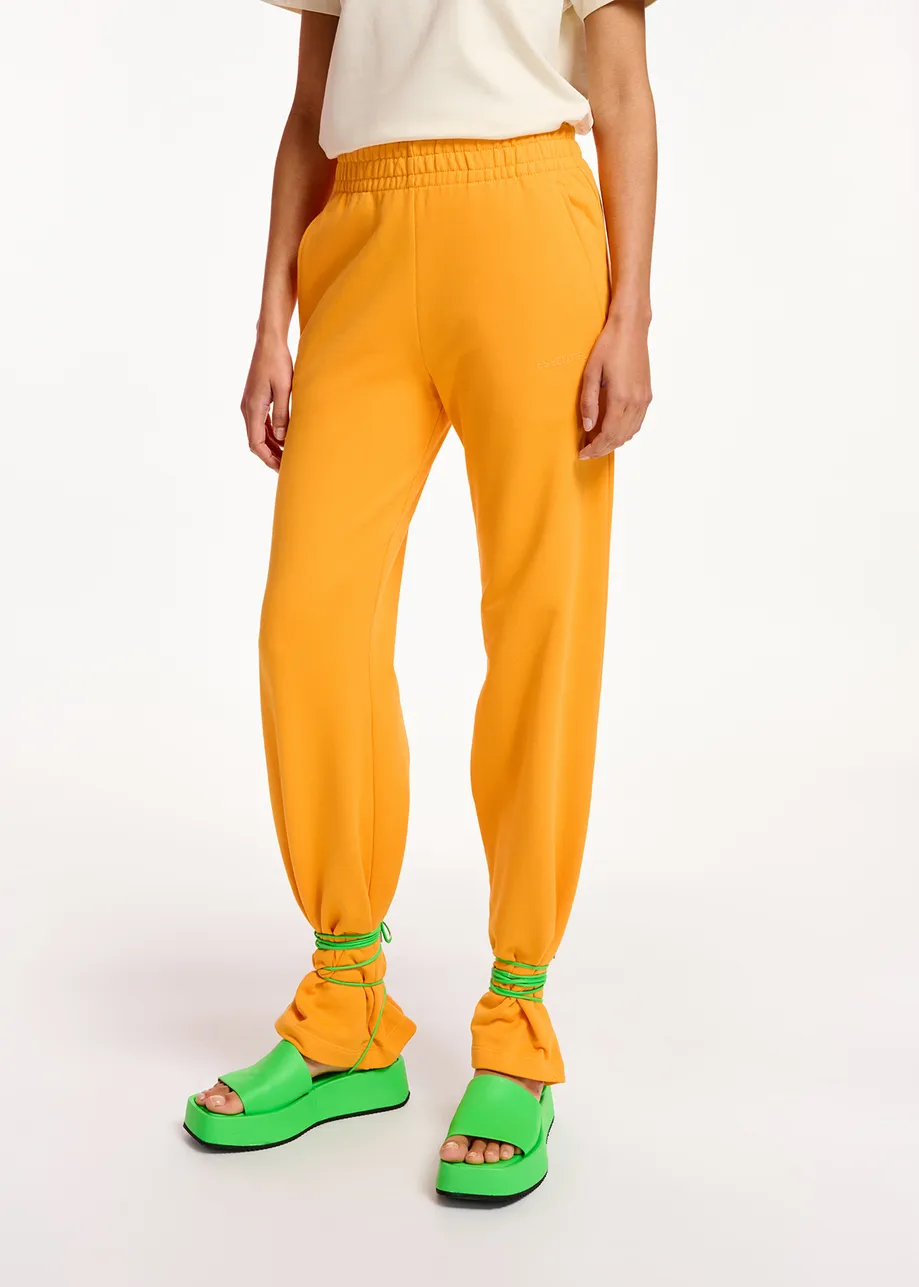 Oranje joggingbroek van biokatoen-jersey