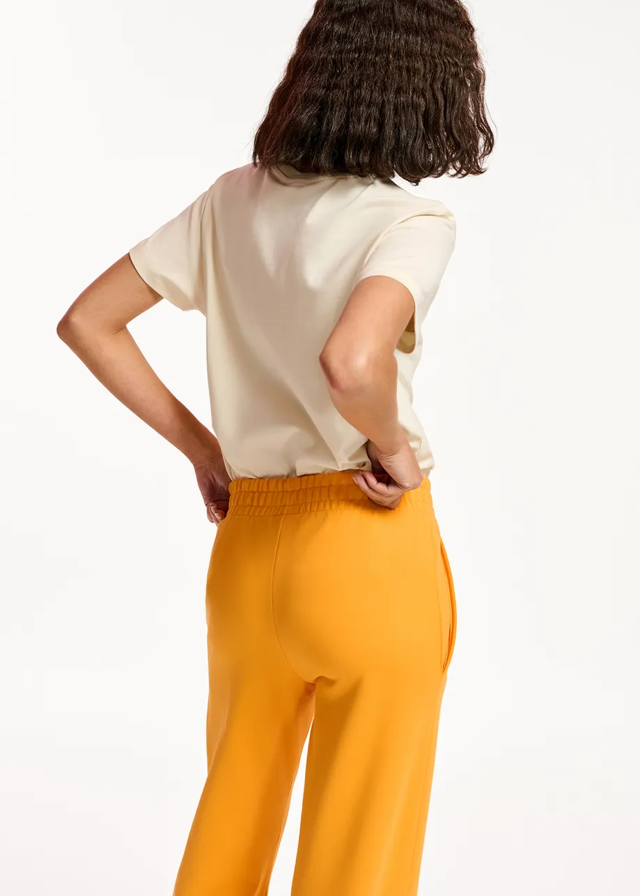 Oranje joggingbroek van biokatoen-jersey