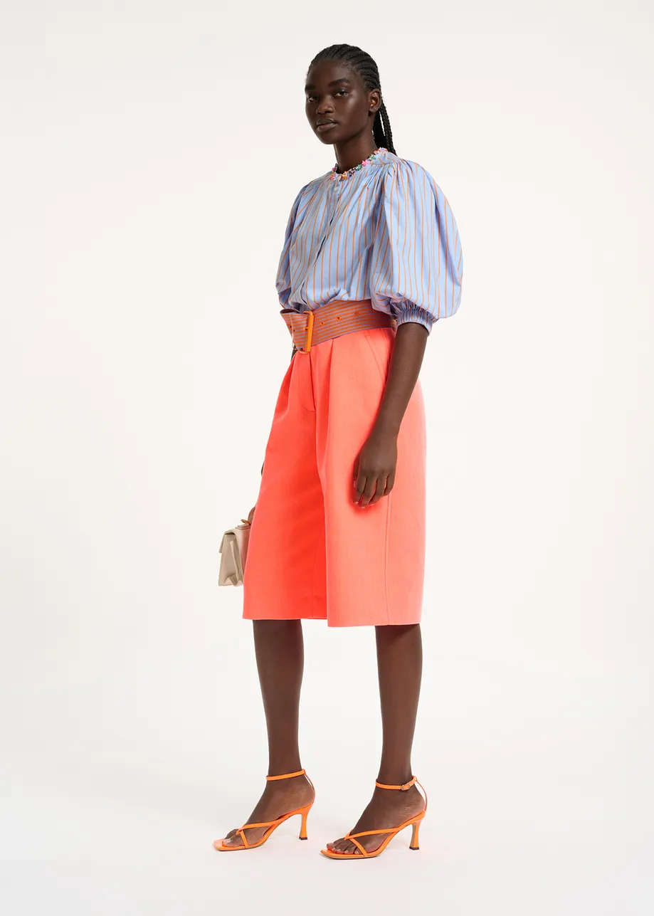 Coral red knee-length shorts