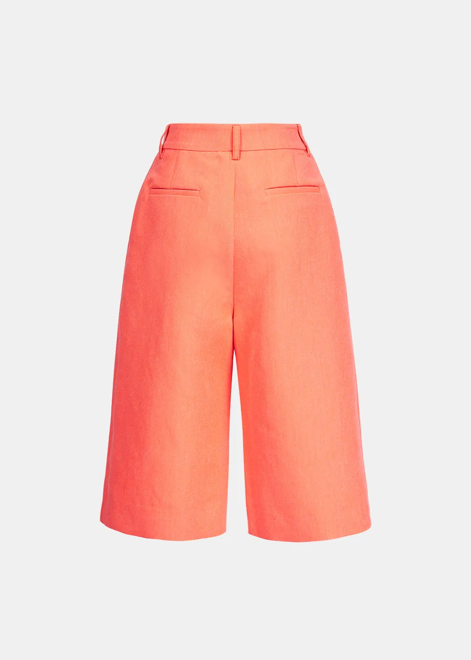 Coral red knee-length shorts