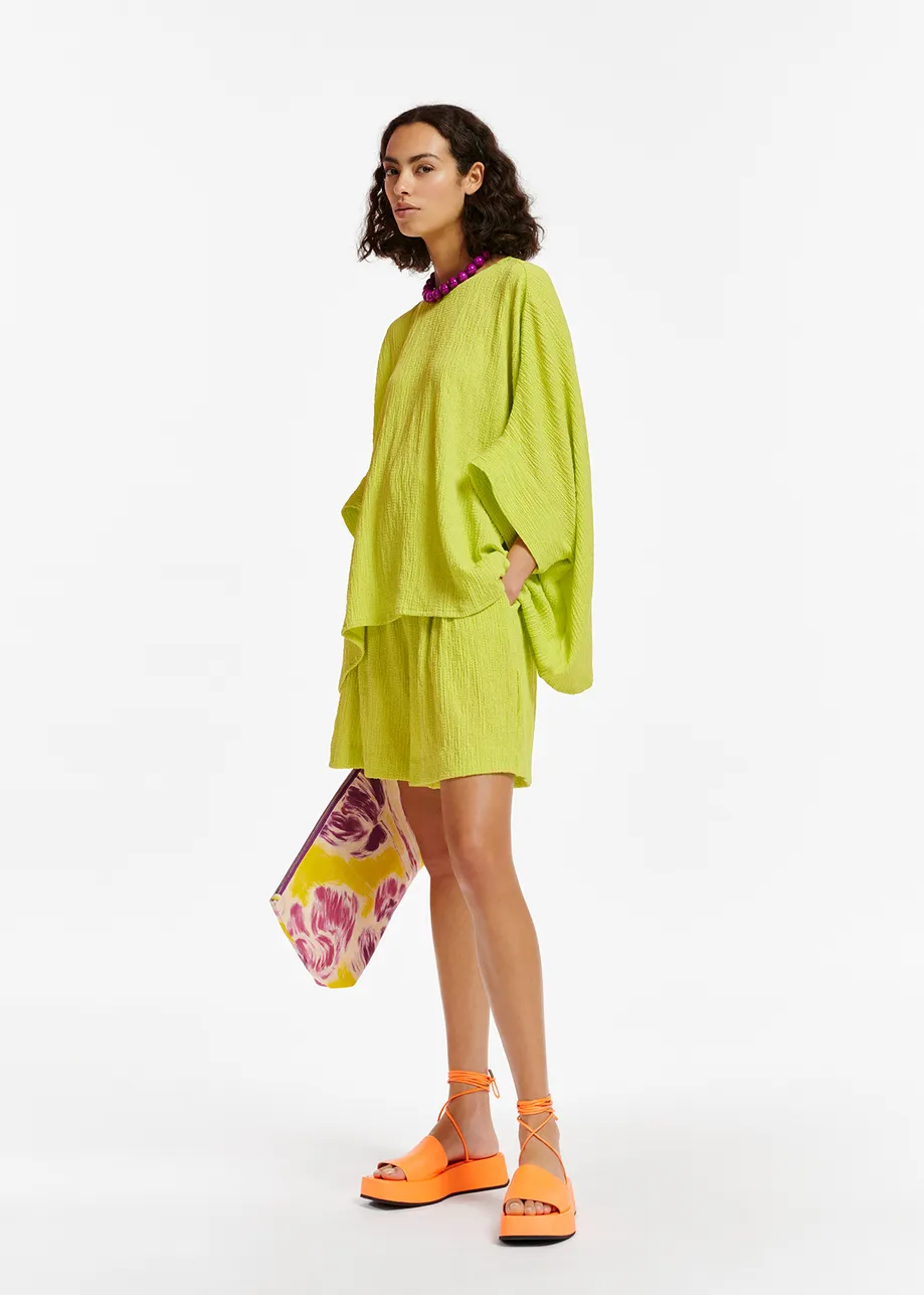 Limoengroene oversized top in cloqué