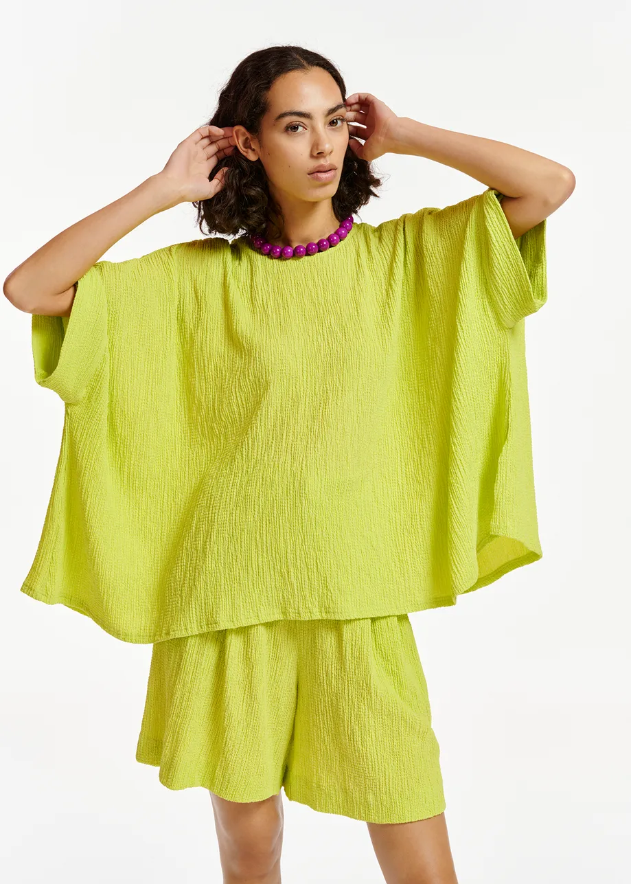 Lime green oversized seersucker top