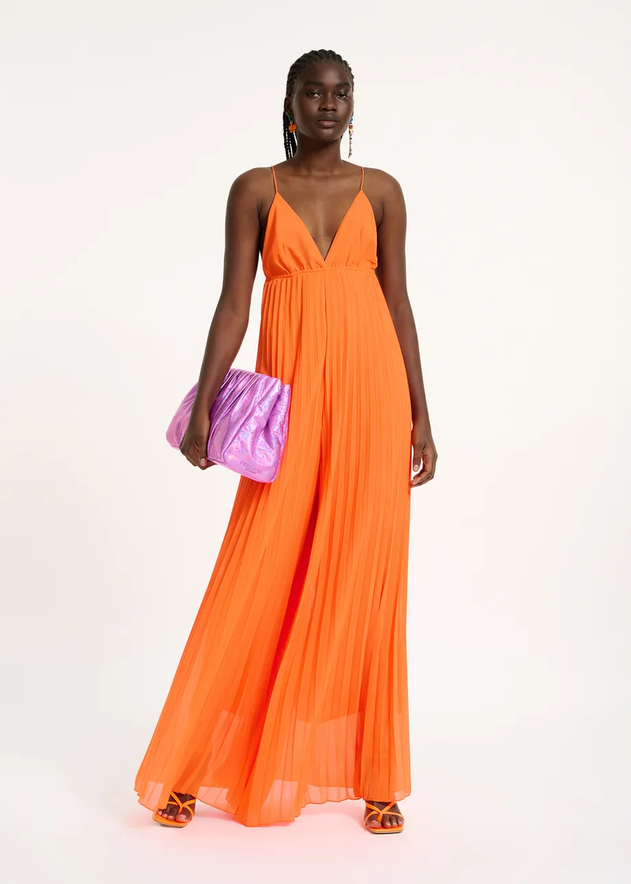 Orange plissé jumpsuit with graphic print