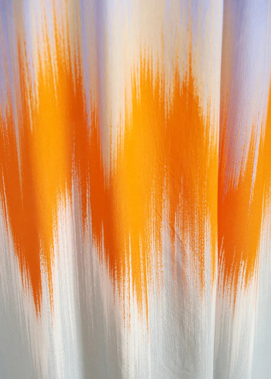 Light blue and orange maxi-length halterneck dress