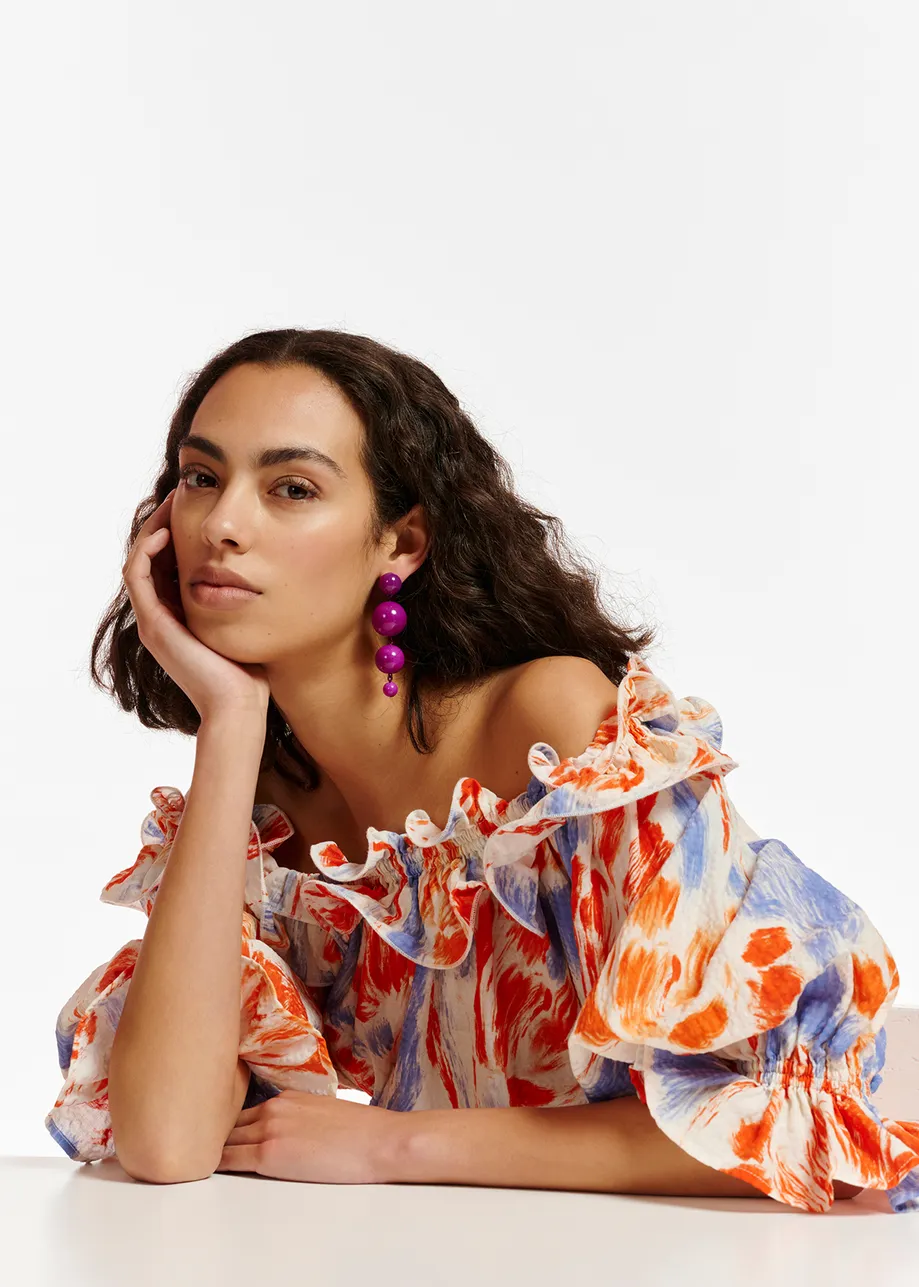 Light blue and orange floral print off-the-shoulder top