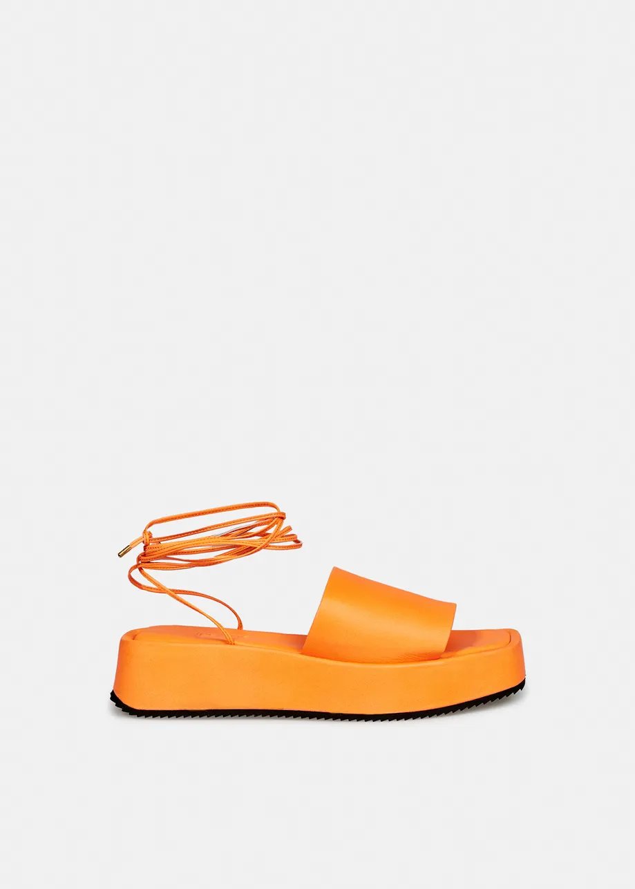Sandales compensées en cuir orange néon avec liens
