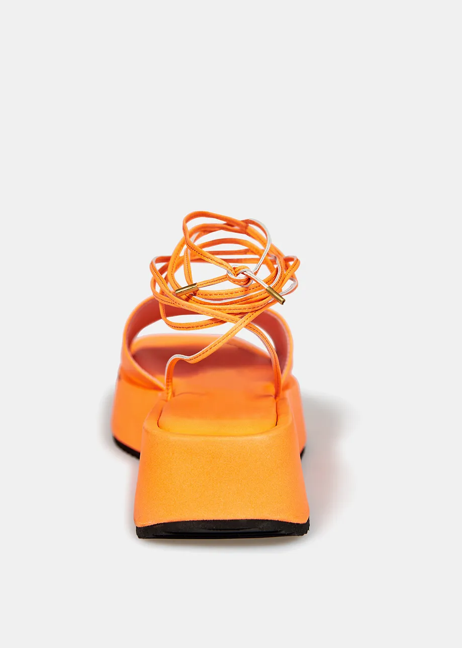 Sandales compensées en cuir orange néon avec liens