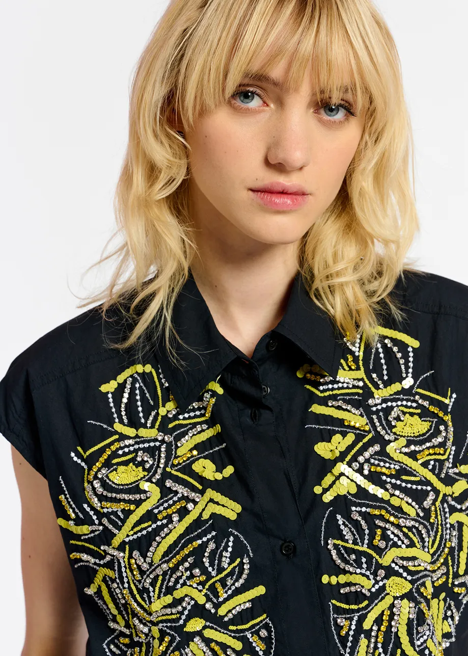 Chemise noire sans manches à strass
