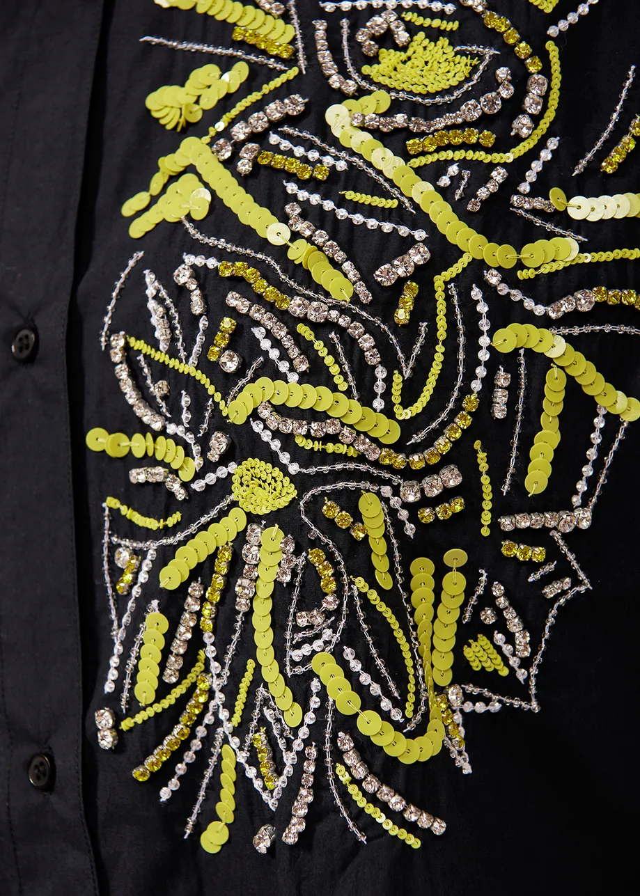 Chemise noire sans manches à strass