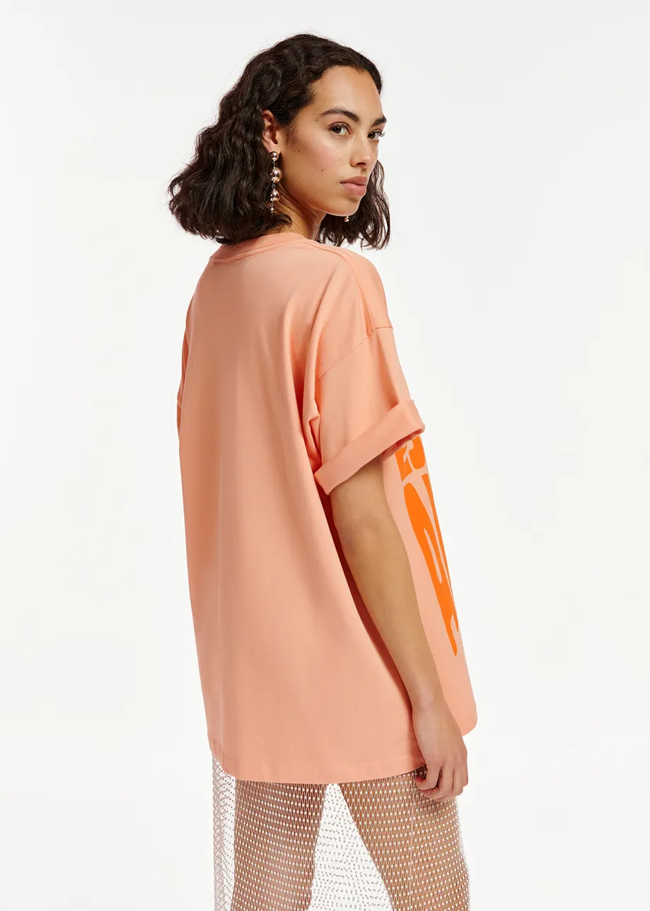 Peach organic cotton T-shirt with text print