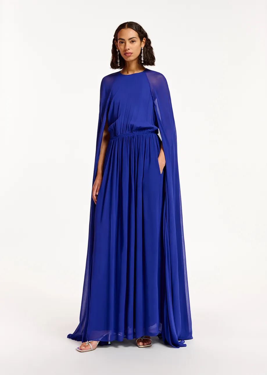 Dark blue maxi dress with cape-like sleeves