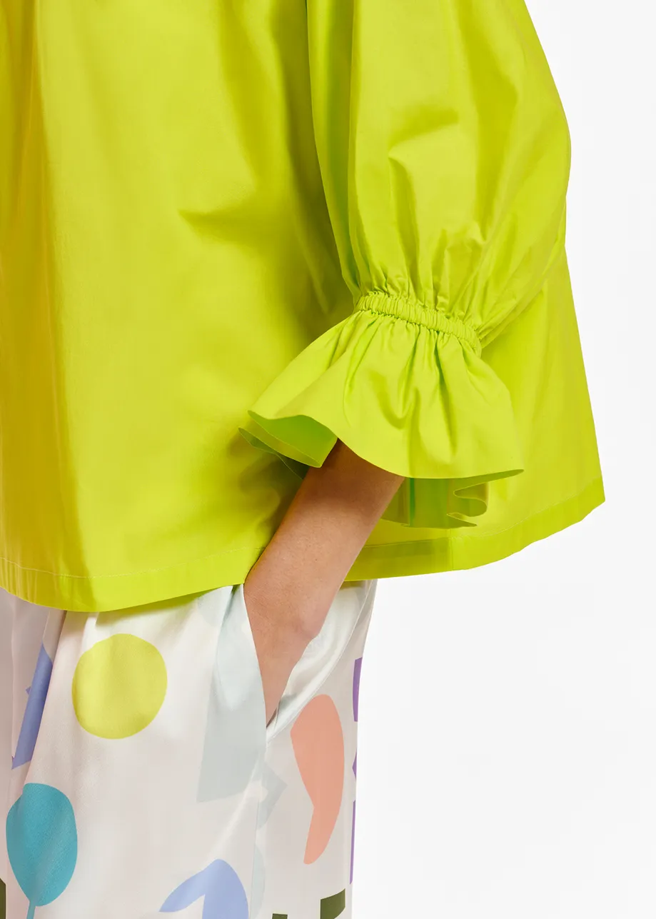 Lime green cotton-poplin top with stand-up collar