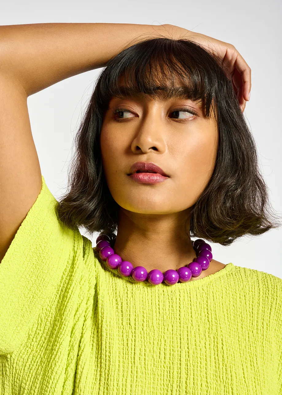 Collier à perles violet