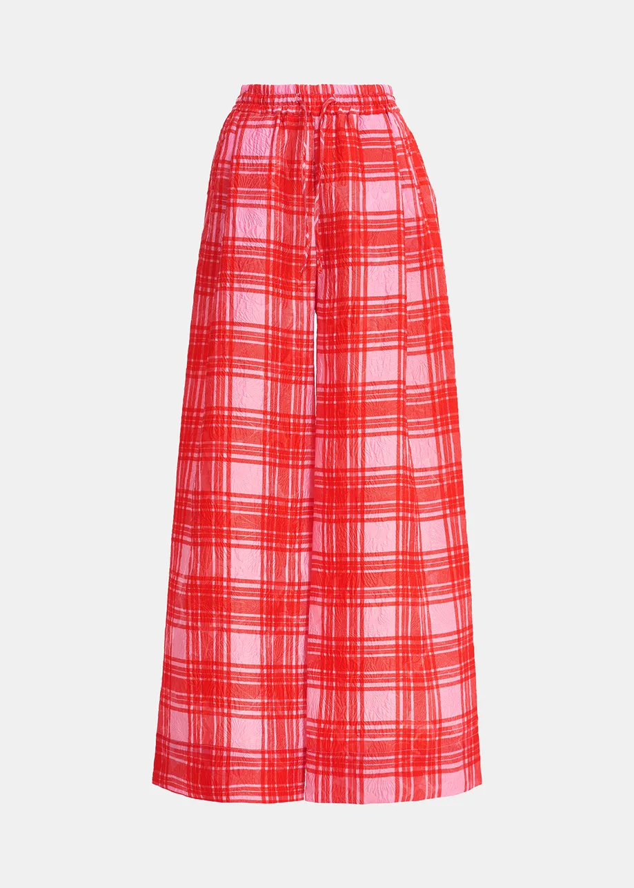 Wijde broek met roze en rood ruitjesmotief
