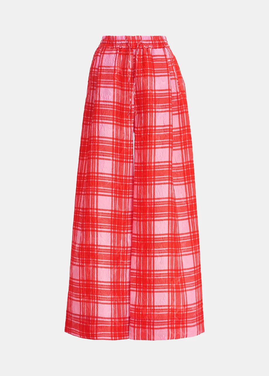 Wijde broek met roze en rood ruitjesmotief