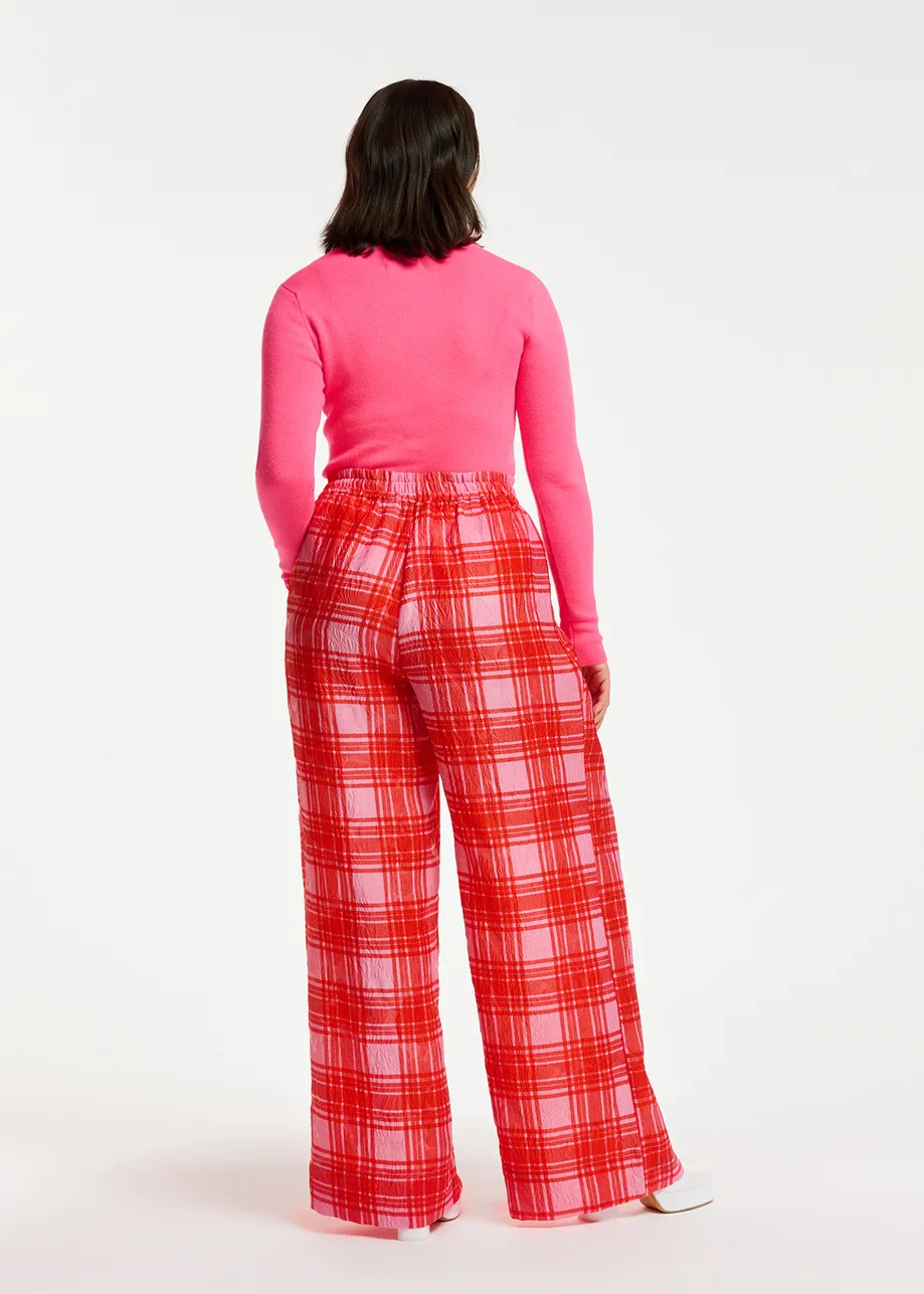 Wijde broek met roze en rood ruitjesmotief