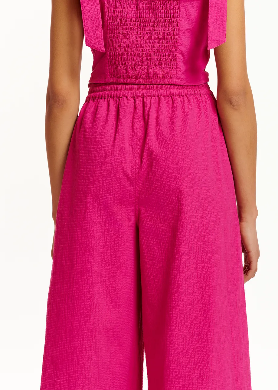Purple bustier top with bows