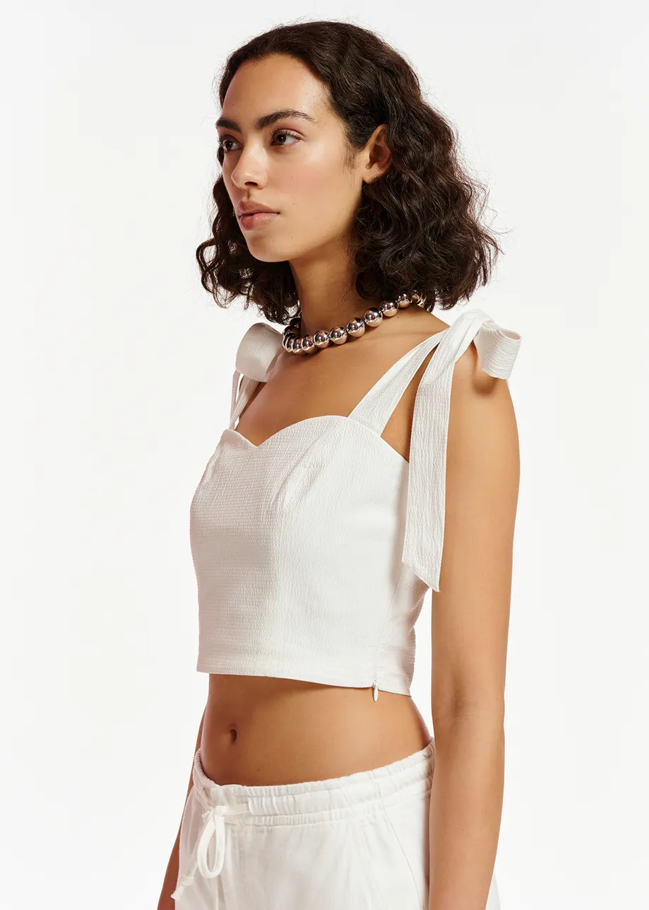 White bustier top with bows