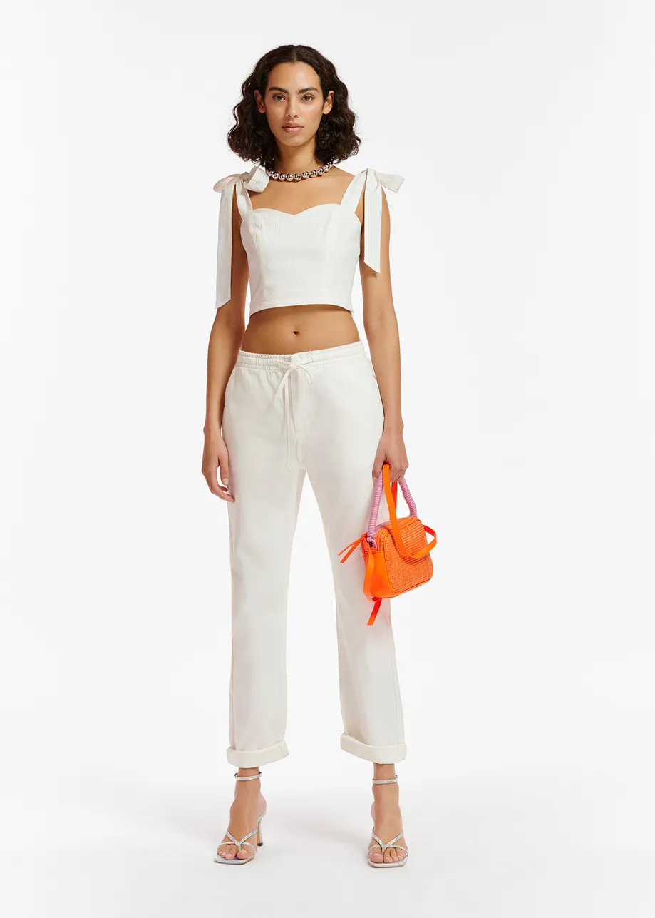 White bustier top with bows