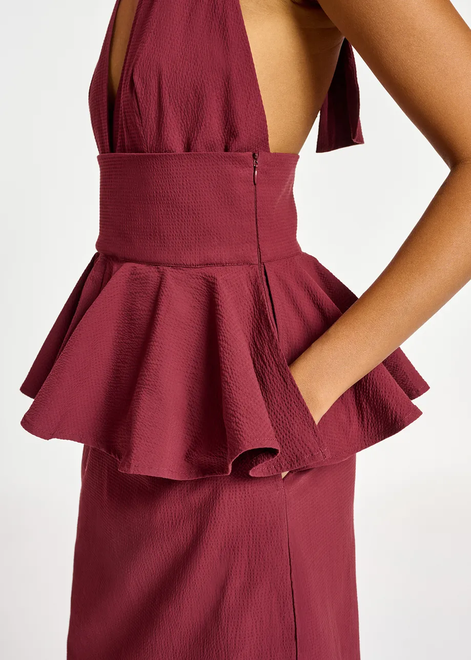 Burgundy halterneck dress with peplum