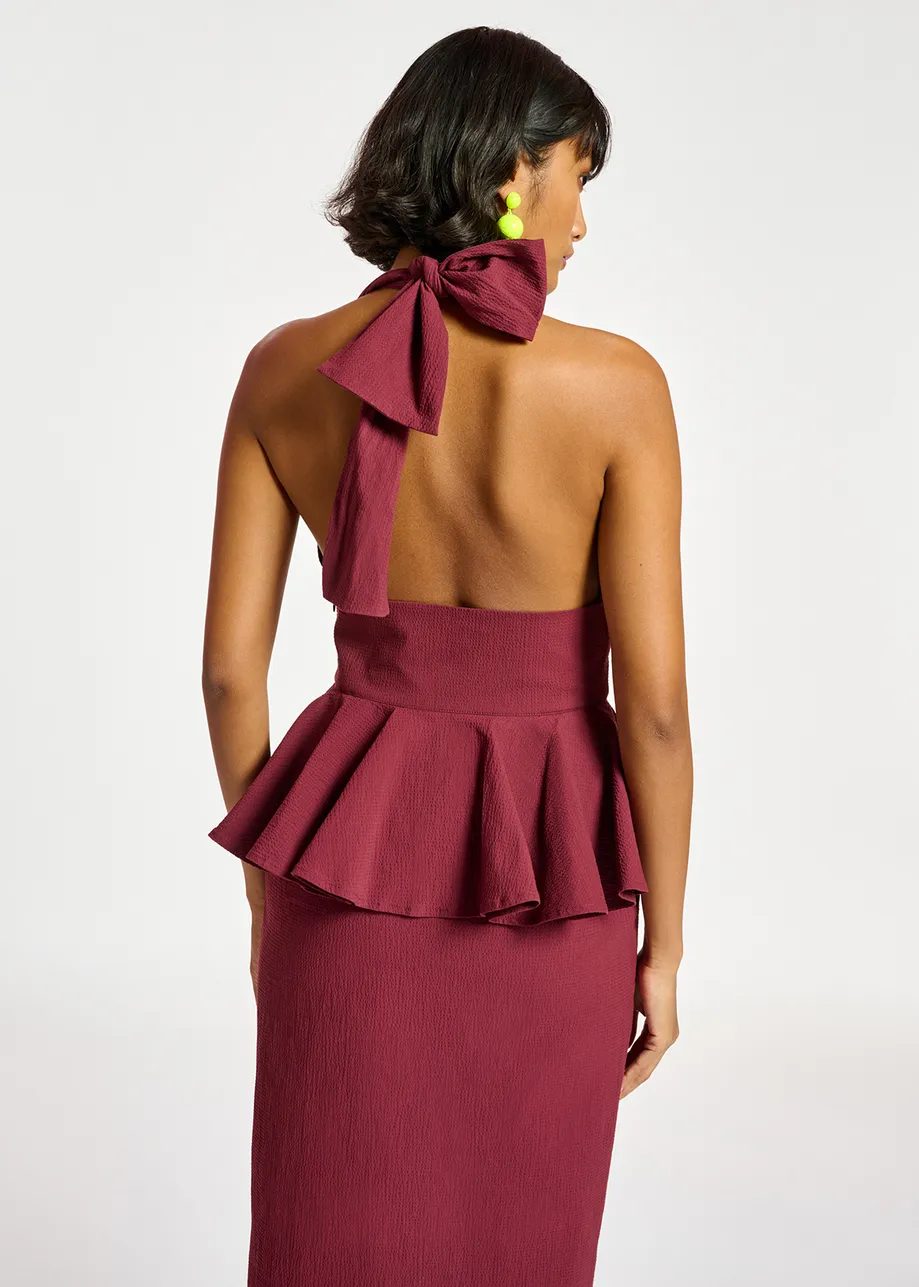 Burgundy halterneck dress with peplum
