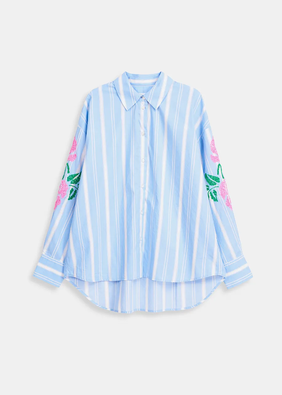 Light blue striped cotton shirt with flower-shaped embroideries