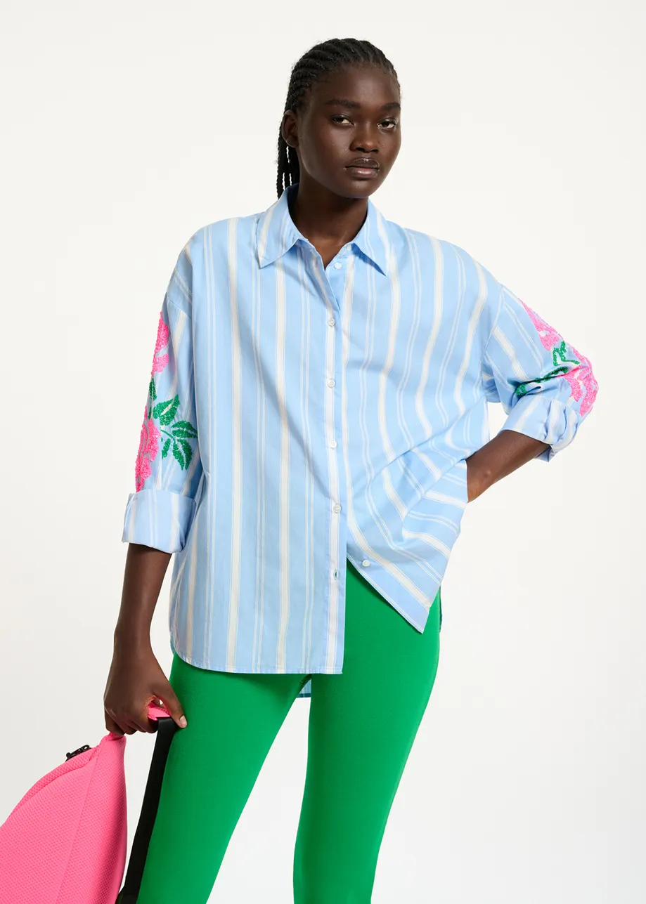 Light blue striped cotton shirt with flower-shaped embroideries
