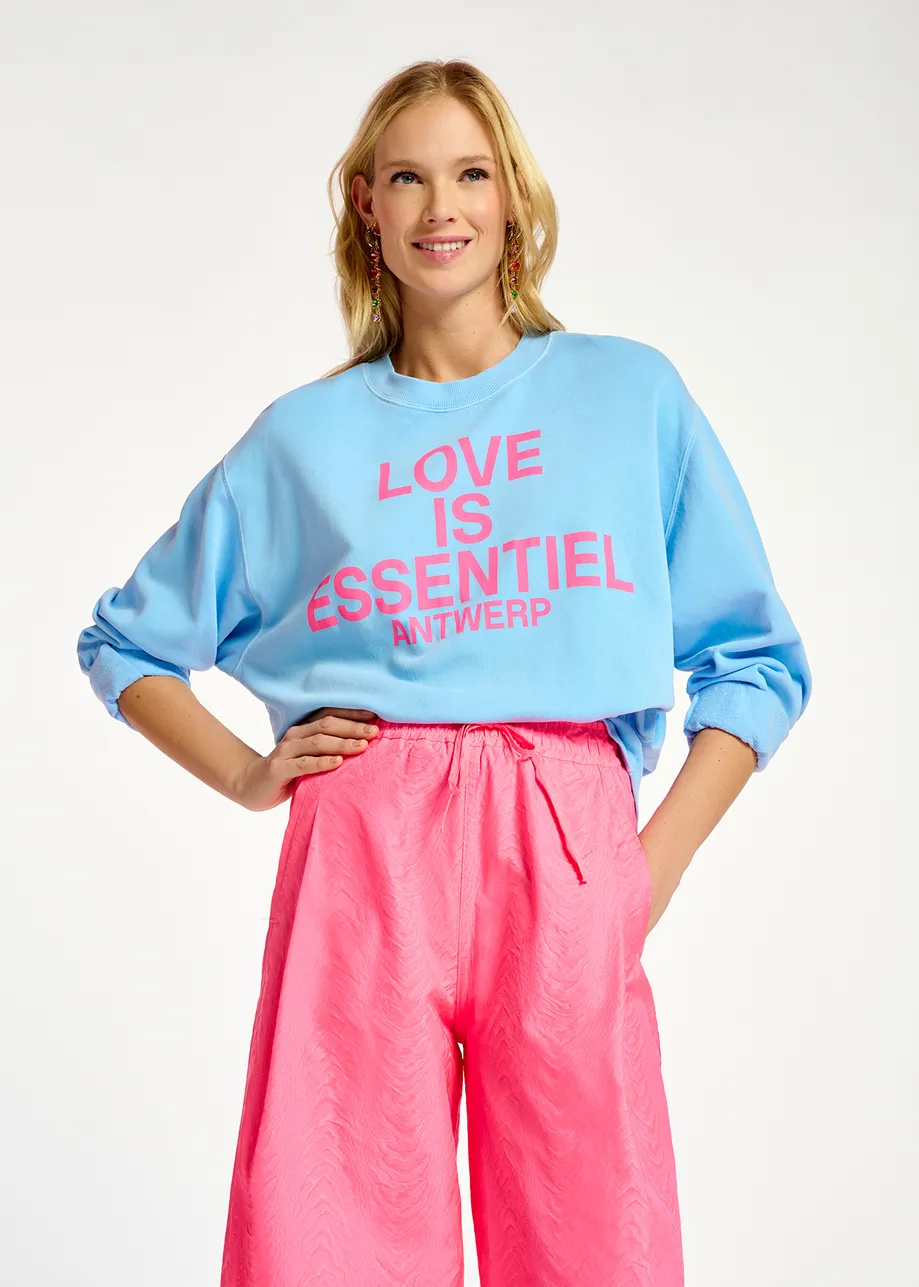 Blue organic cotton sweatshirt with text print