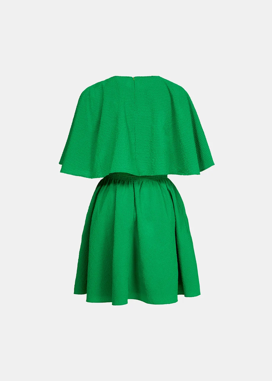 Groene mini-jurk met cape-mouwen
