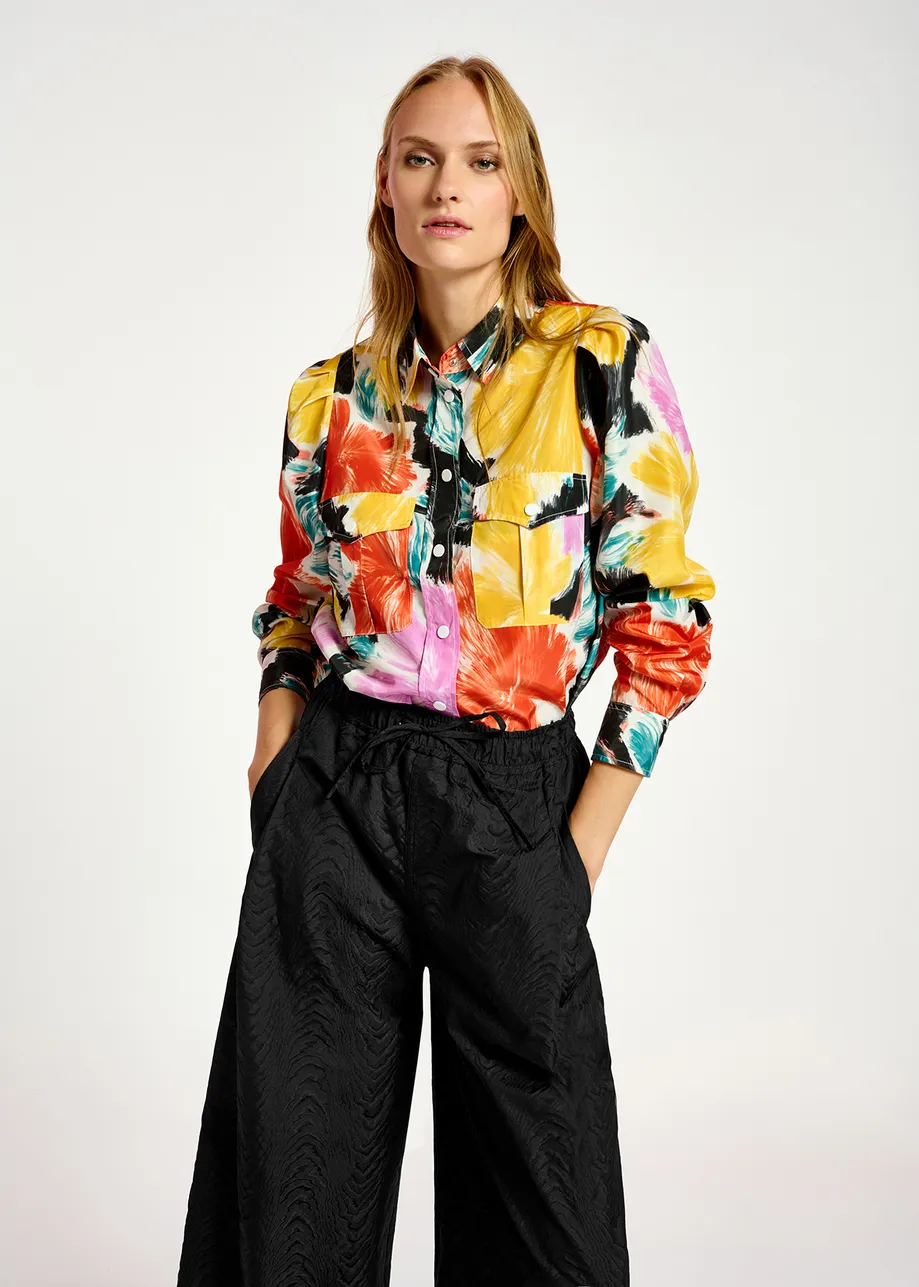 Black, orange and yellow floral print shirt