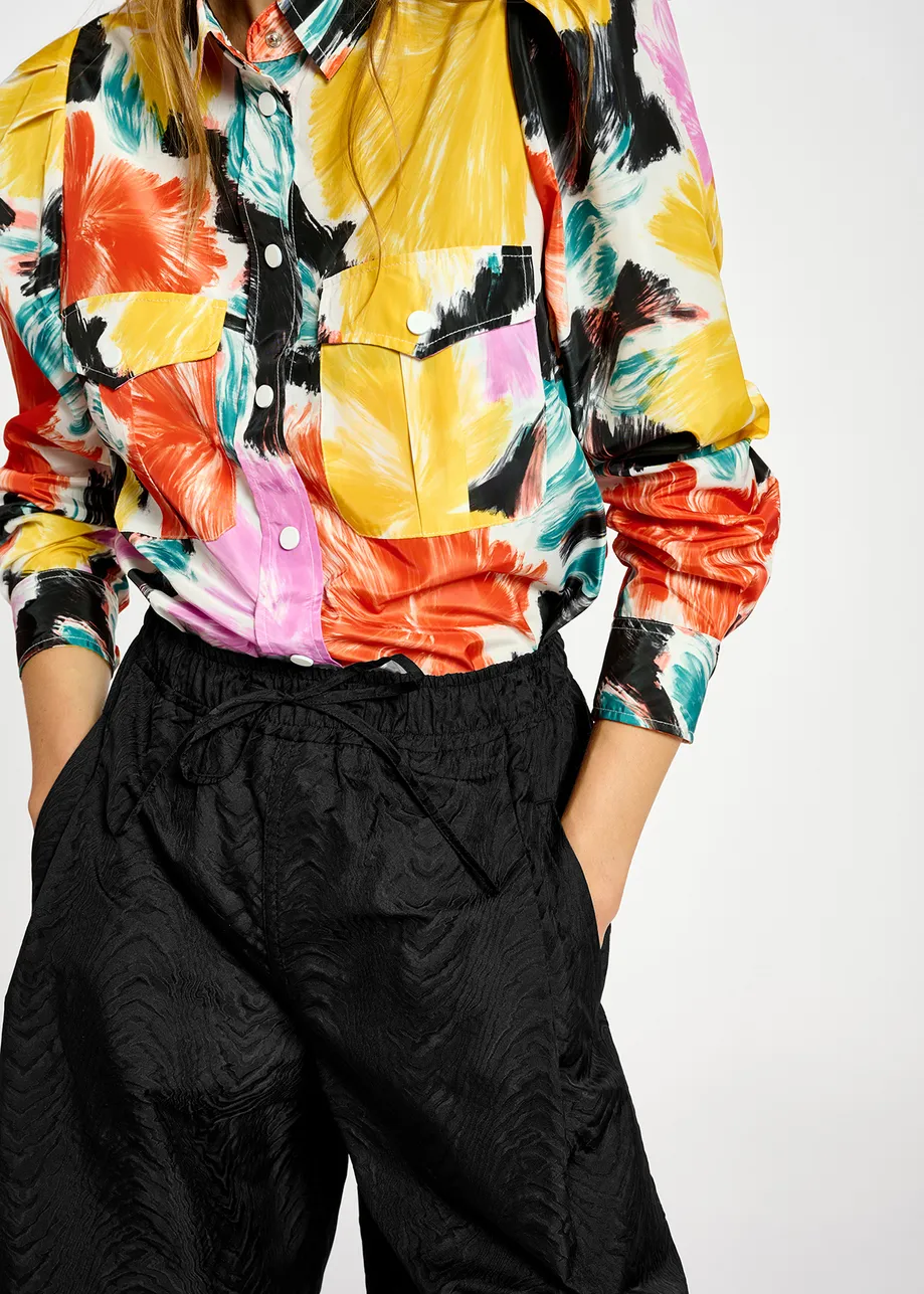 Black, orange and yellow floral print shirt