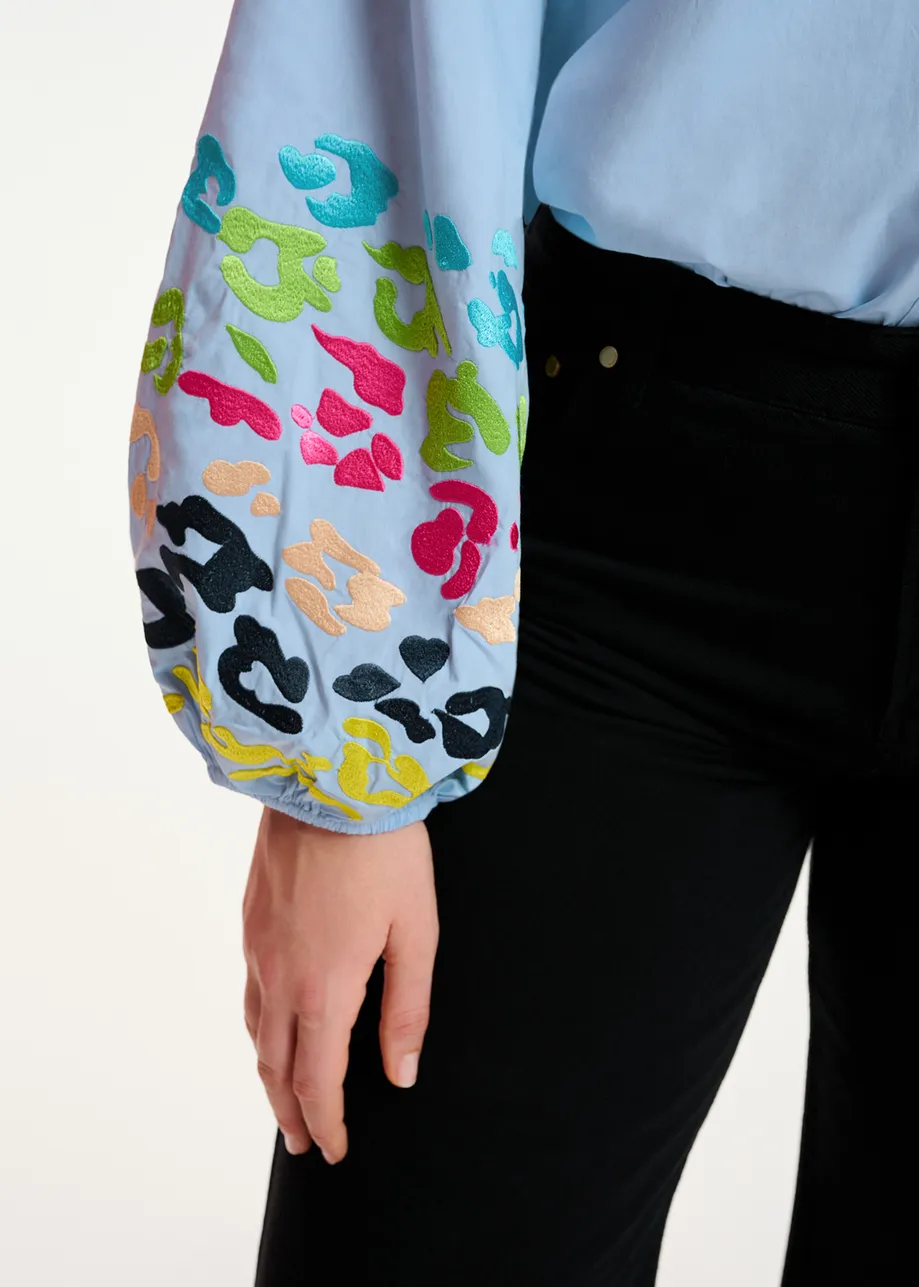 Blue cotton shirt with embroideries