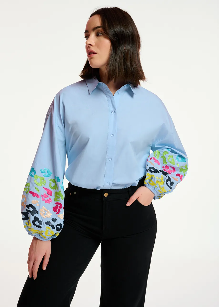 Blue cotton shirt with embroideries