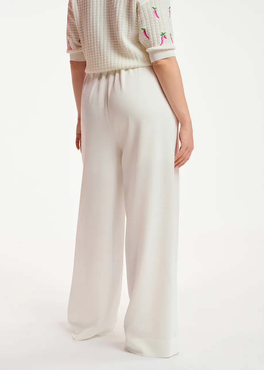 Pantalon blanc cassé à jambes larges