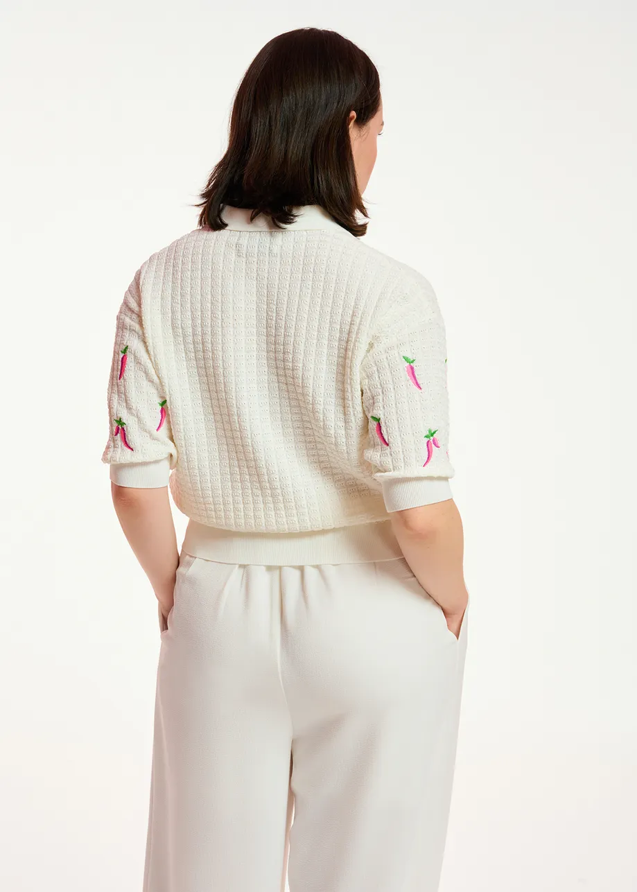 Pantalon blanc cassé à jambes larges